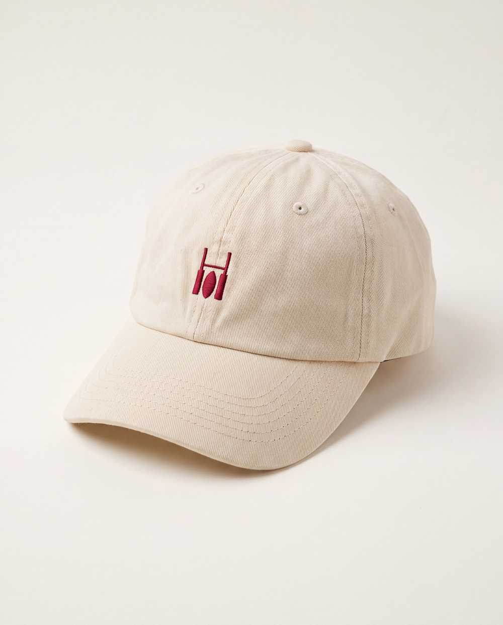 Rugby Culture Beige & Maroon Cap, front view with maroon embroidered goalpost logo