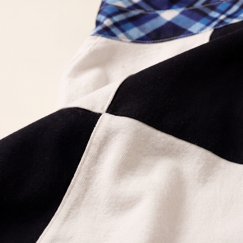 Close-up of the quartered panels and collar of the Rugby Culture Scotland Rugby Polo