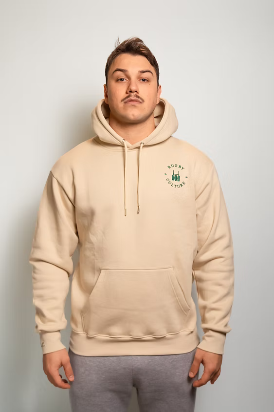 Rugby Culture Beige Hoodie worn by a male model, front view