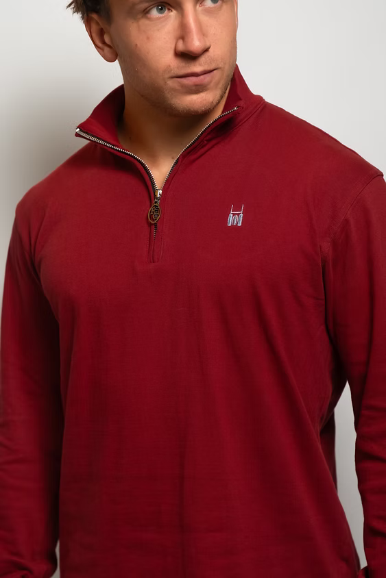 Rugby Culture Maroon Quarter-Zip worn by a male model, close-up of the zip collar