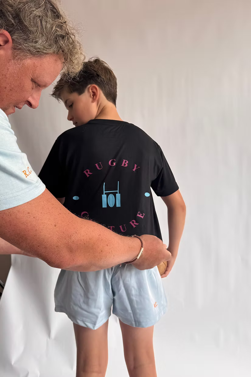 Rugby Culture Kids Black T-Shirt, back print detail on a young player