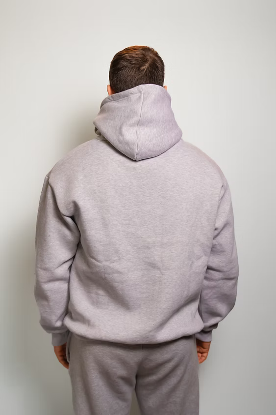 Rugby Culture Grey Hoodie worn by a male model, back view