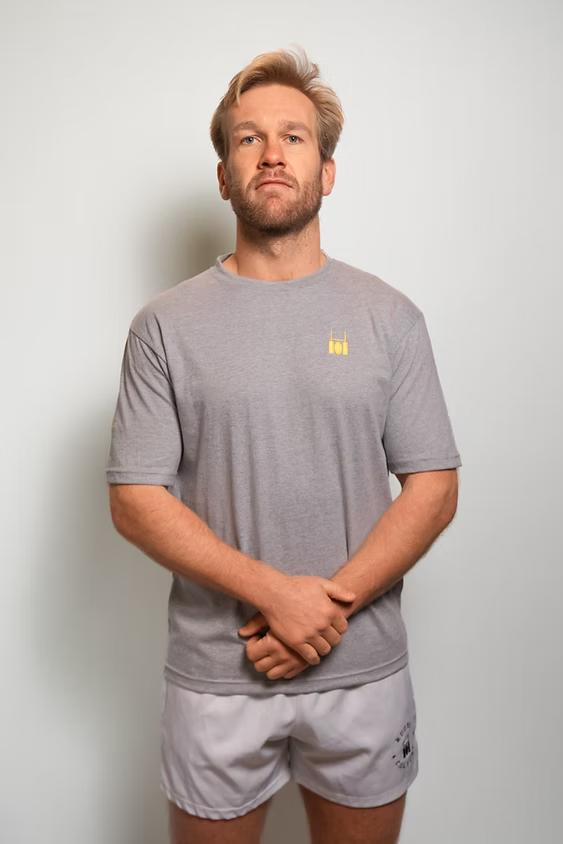 Rugby Culture Grey Basic Logo T-Shirt worn by a male model, relaxed front view