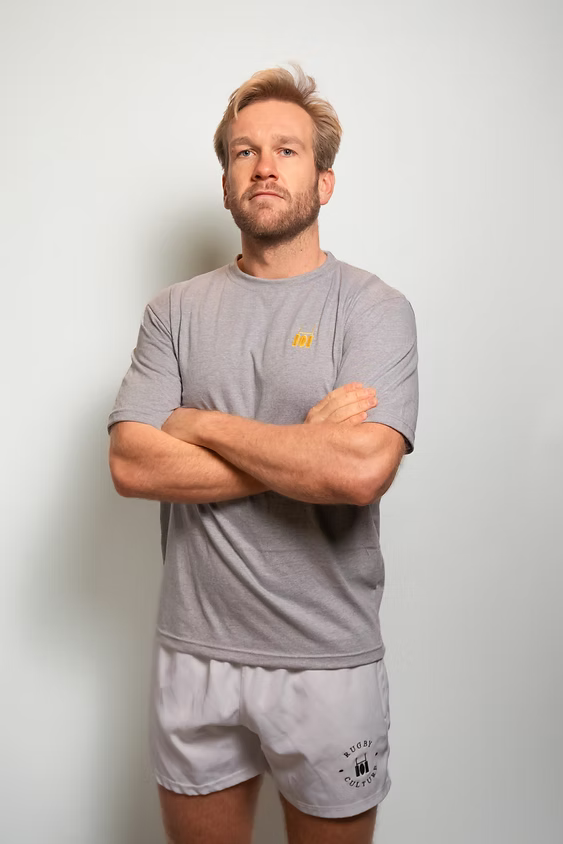 Rugby Culture Grey Basic Logo T-Shirt worn with grey shorts, front view