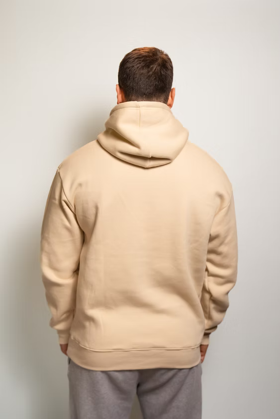 Rugby Culture Beige Hoodie worn by a male model, back view