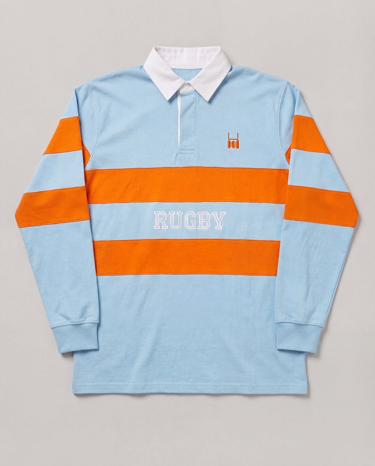 Rugby Culture Sky Blue & Orange Rugby Polo with orange stripes and white collar, flat lay front view