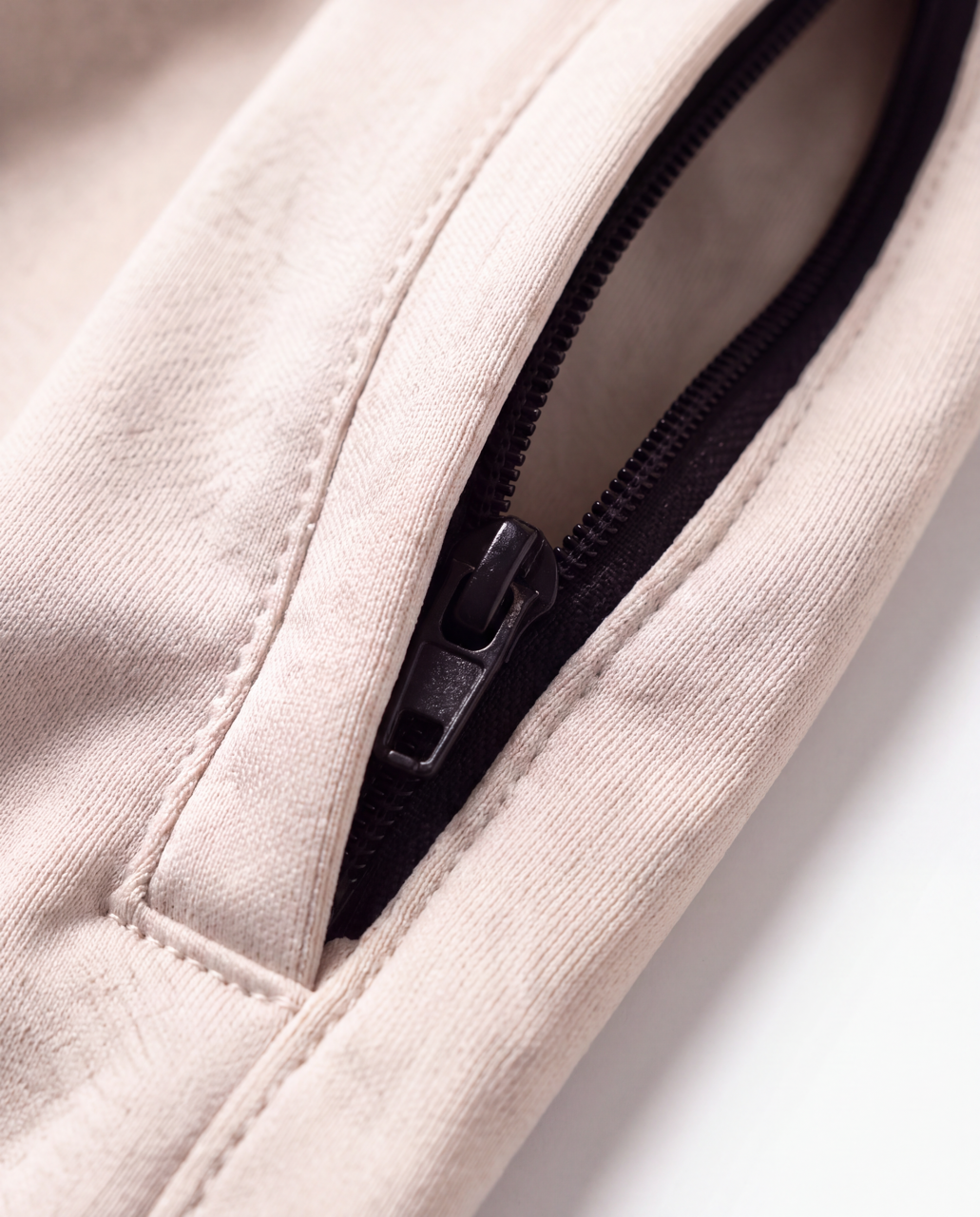 Close-up of the zip pocket on Rugby Culture Beige Scrum Shorts